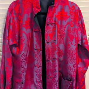 A vintage silk jacket in a vibrant pink